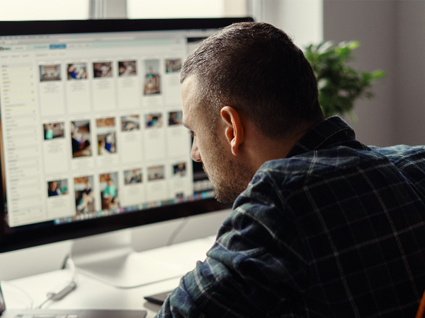 man at a computer screen